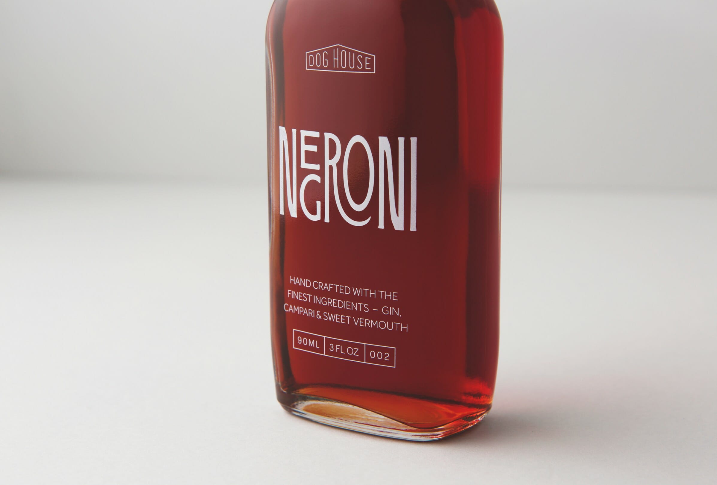 Packaging design, art direction and custom typography for a range of pre-mixed cocktails for Doghouse Bar at the Waterside Hotel.