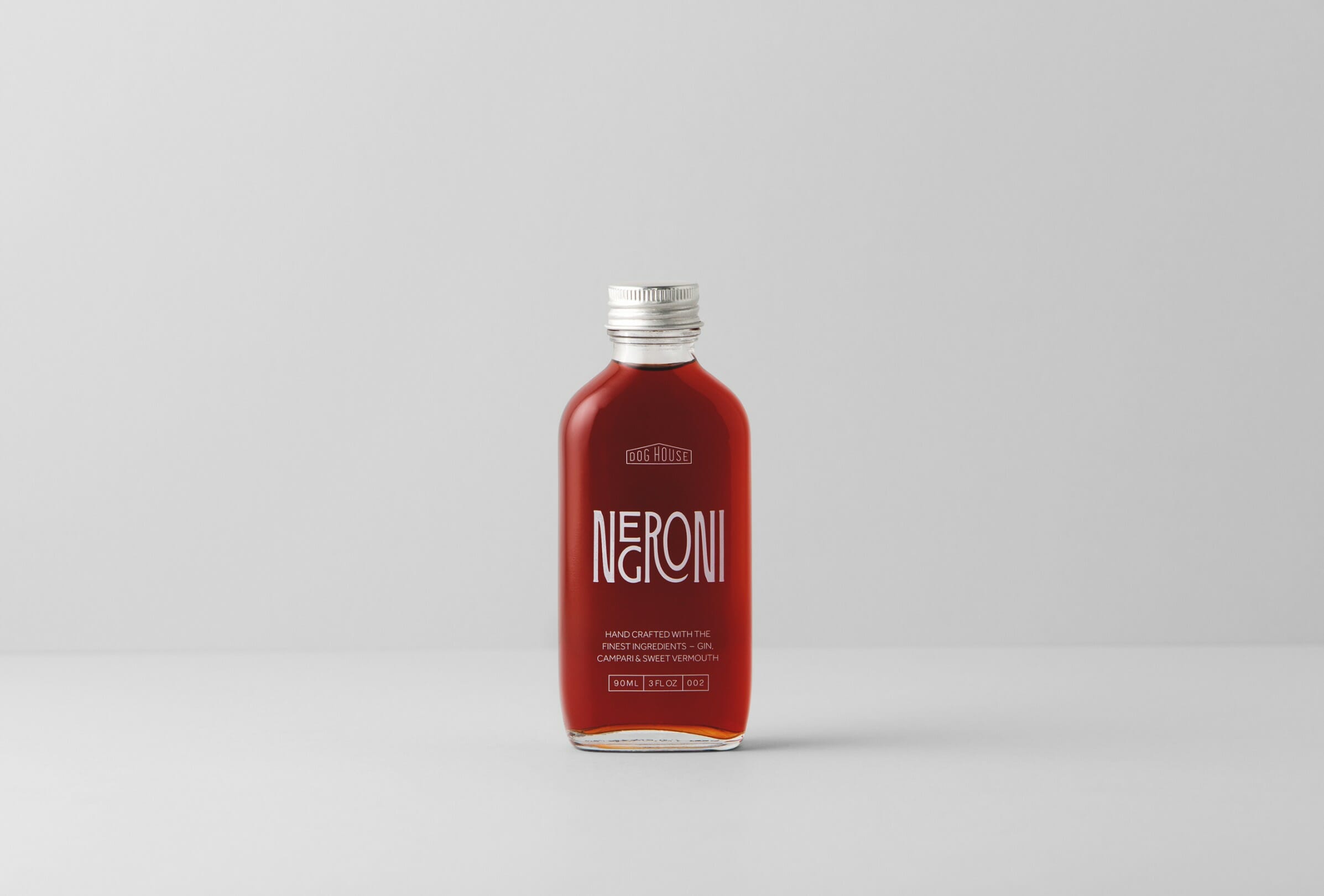Packaging design, art direction and custom typography for a range of pre-mixed cocktails for Doghouse Bar at the Waterside Hotel.